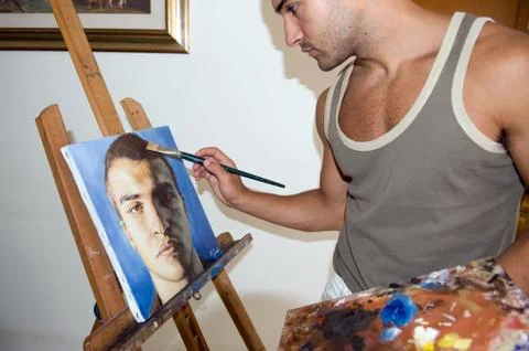 Young painter with his canvas Stock Photos