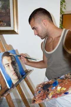 Young painter with his canvas Stock Photos