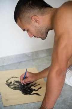 Young painter with his canvas Stock Photos