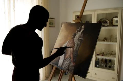 Young painter with his canvas  Stock Photos