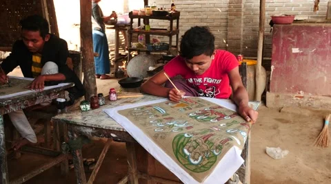 Young painter making picture on paper - Myanmar Stock Footage 61419243