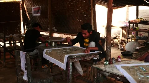 Young painter making picture on paper - Myanmar Stock Footage 61419244