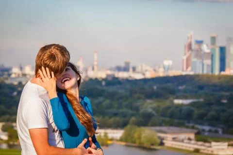 Young pair on a background of blue sky Stock Photos