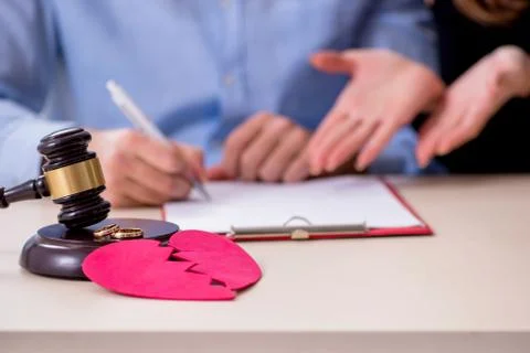 Young pair in courthouse in divorcing concept Fotos Stock