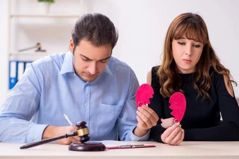 Young pair in courthouse in divorcing concept Fotos Stock
