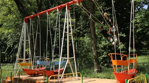 Young pair on a swing Stock Footage 7751805