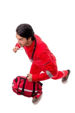 The young paramedic in red uniform isolated on white 스톡 사진