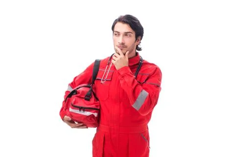 The young paramedic in red uniform isolated on white Stock Photos