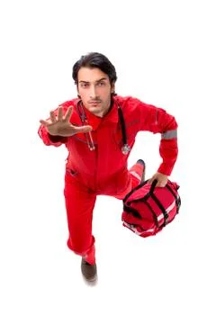 The young paramedic in red uniform isolated on white Stock Photos