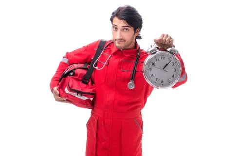 The young paramedic in red uniform isolated on white 스톡 사진