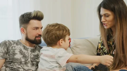 Young parents and a child Stock Footage 100000078