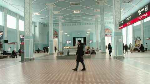 A young passenger walks through the station. Inspects the interior of the Stock Footage 199515570