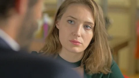 Young passionate designer talking with client about fashion collection on sale. Stock Footage 80469434