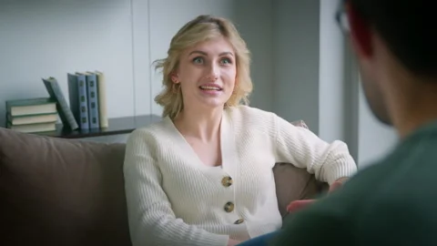 Young patient talking about her problem to a psychiatrist Stock Footage 154243799