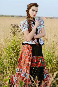 Young peasant woman, dressed in Hungarian national costume Stock Photos