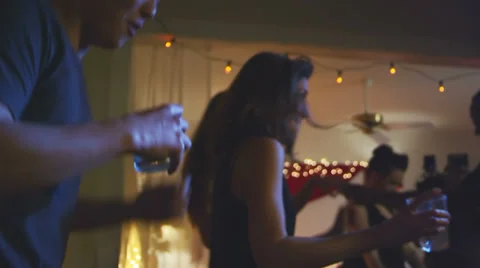 Young people of all colors dance and mingle at a house party Vidéo 34015973