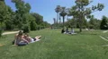 Young people and families relaxing in Ciutadella Park, Barcelona 4k or 4k+ Resolution
