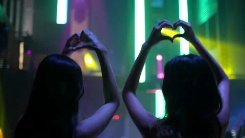 Young people are having fun dancing in club. Nightlife and disco concept. Vídeos de archivo 140246026