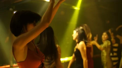 Young people are having fun dancing in club. Nightlife and disco concept. Stock Footage 140247375