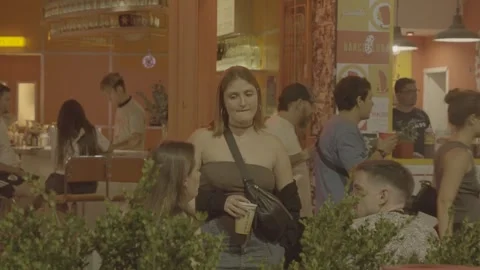 Young people chatting at a bar in Buenos Aires, Argentina Video stock 345138199