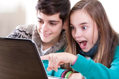 Young people with computer Stock Photos