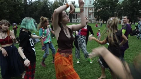 Young people dance during the "Mad tea party" in Tsaritsyno Park of Moscow 스톡 동영상 150230374