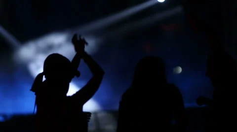 Young people dancing on the stage, crowd partying at a rock concert Video stock 65662965