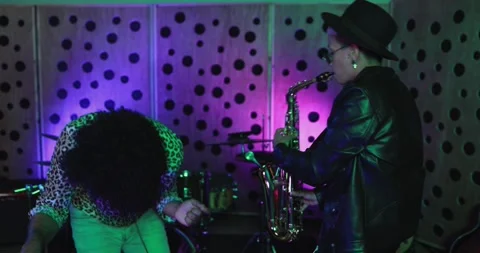 Young people dancing while mixing new album inside recording studio Stock Footage 153404807