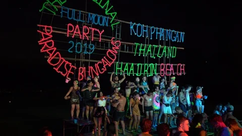 Young people from different countries dancing on the beach under the moon Stock Footage 106822768