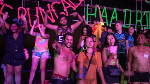 Young people from different countries dancing on the beach under the moon Stock Footage 106823251