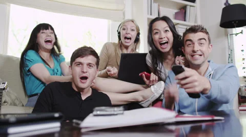 Young people with digital technology having fun. Student house accommodation. Vídeos de archivo 32938908