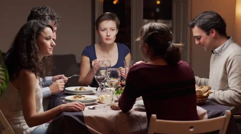 Young people dining together Stock Footage 46487133