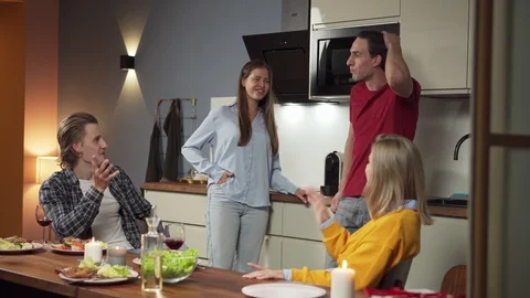 Young people discussing in kitchen Stock Footage 114811564