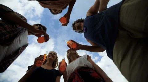 Young people drinking a beer Stock Footage 68799956