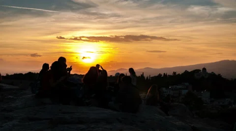 Young people enjoying sunset Stock Footage 56582017
