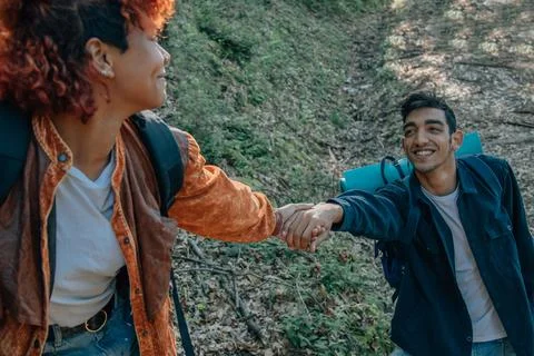 Young people on excursion cooperating 스톡 사진