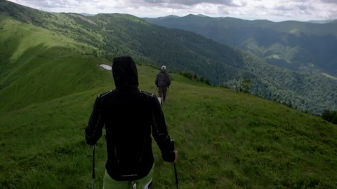 Young people with gogs Fox terrier hiking in mountains, travel, fitness or Stock-Footage 88909297