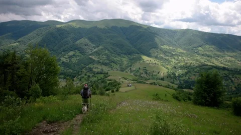 Young people with gogs Fox terrier hiking in mountains, travel, fitness or Stock-Footage 88909782