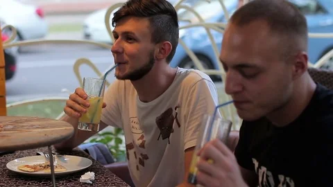Young people having fun in a cafe Stock Footage 78549439