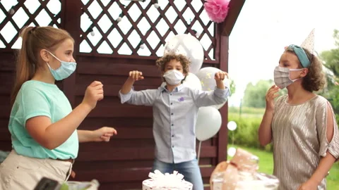 Young people having fun dancing together during corona virus outbreak. Youth Stock Footage 140264360
