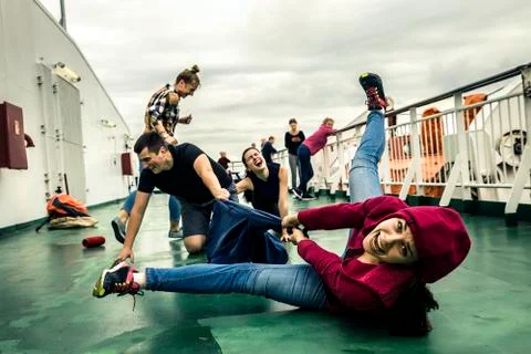 Young people having fun on the deck Stockfoto's