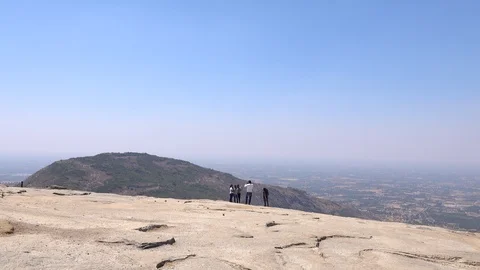 Young people on a hilltop Stock Footage 87664332