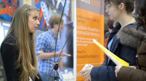 Young people on a job fair Stock Footage 44348997