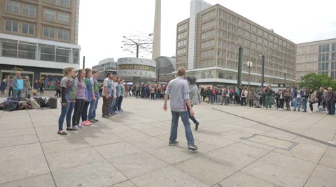 Young people making a pantomime show in Alexanderplatz, Berlin Stock Footage 52993005