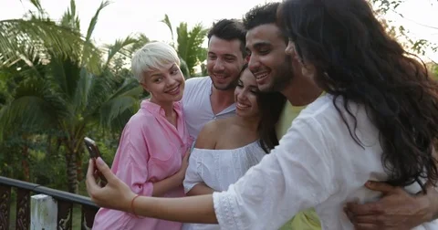 Young People Making Self Portrait Embracing Outdoors On Cell Smart Phone, Happy Stock Footage