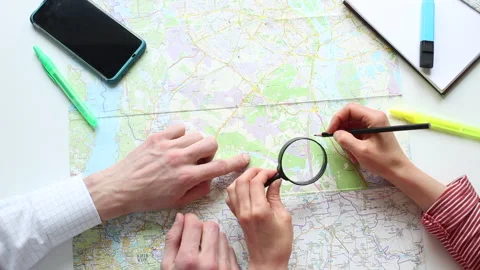 Young people plan a vacation using the world map. Stock Footage 132093492