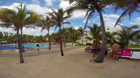 Young people in the pool area of a resort during Spring Break Stock Footage 47753476