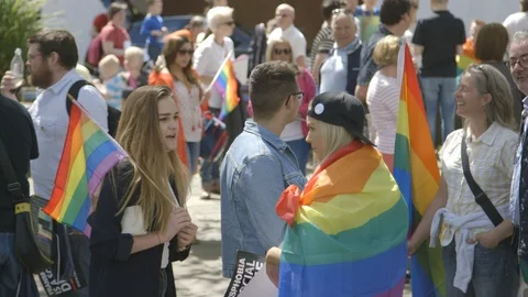 Young people with rainbow flags March for Marriage Equality, Belfast UK, HD Stock Footage 119937620