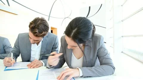 Young people signing application form Video stock 14828204