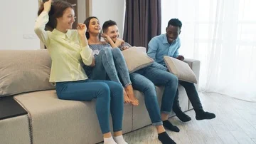 Young people socialising together and having fun. Student house accommodation Stock Footage 86131253